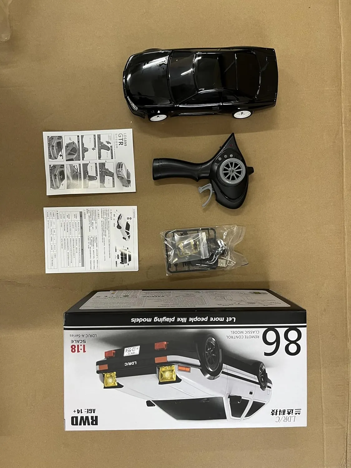 GoolRC Remote Control Car, 1:18 Scale RWD RC Drift Car, 2.4GHz Drifting Racing Vehicle with Gyro, LED Lights, Rechargeable Battery, Full Proportional Alloy Body Shell for Kids Adults (Black)